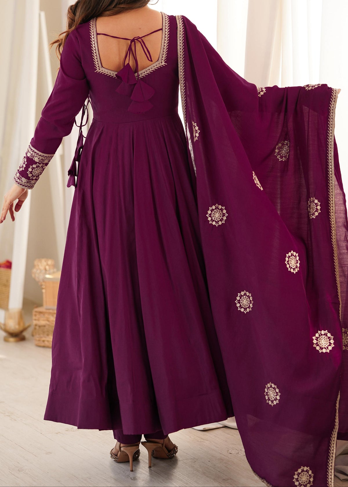 Angrakha style designer anarkali suit with backside fancy tassels