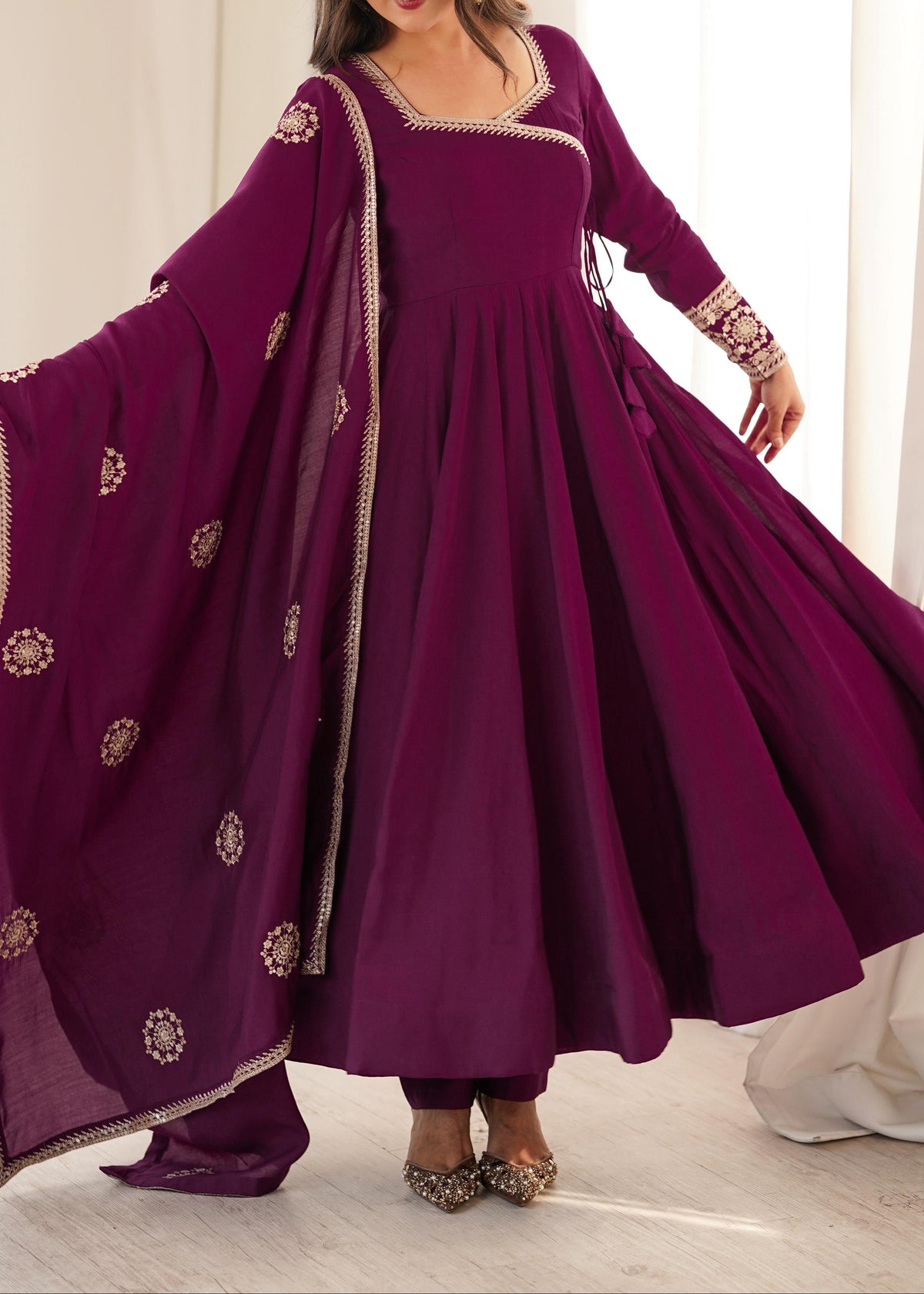 Angrakha style designer anarkali suit with backside fancy tassels