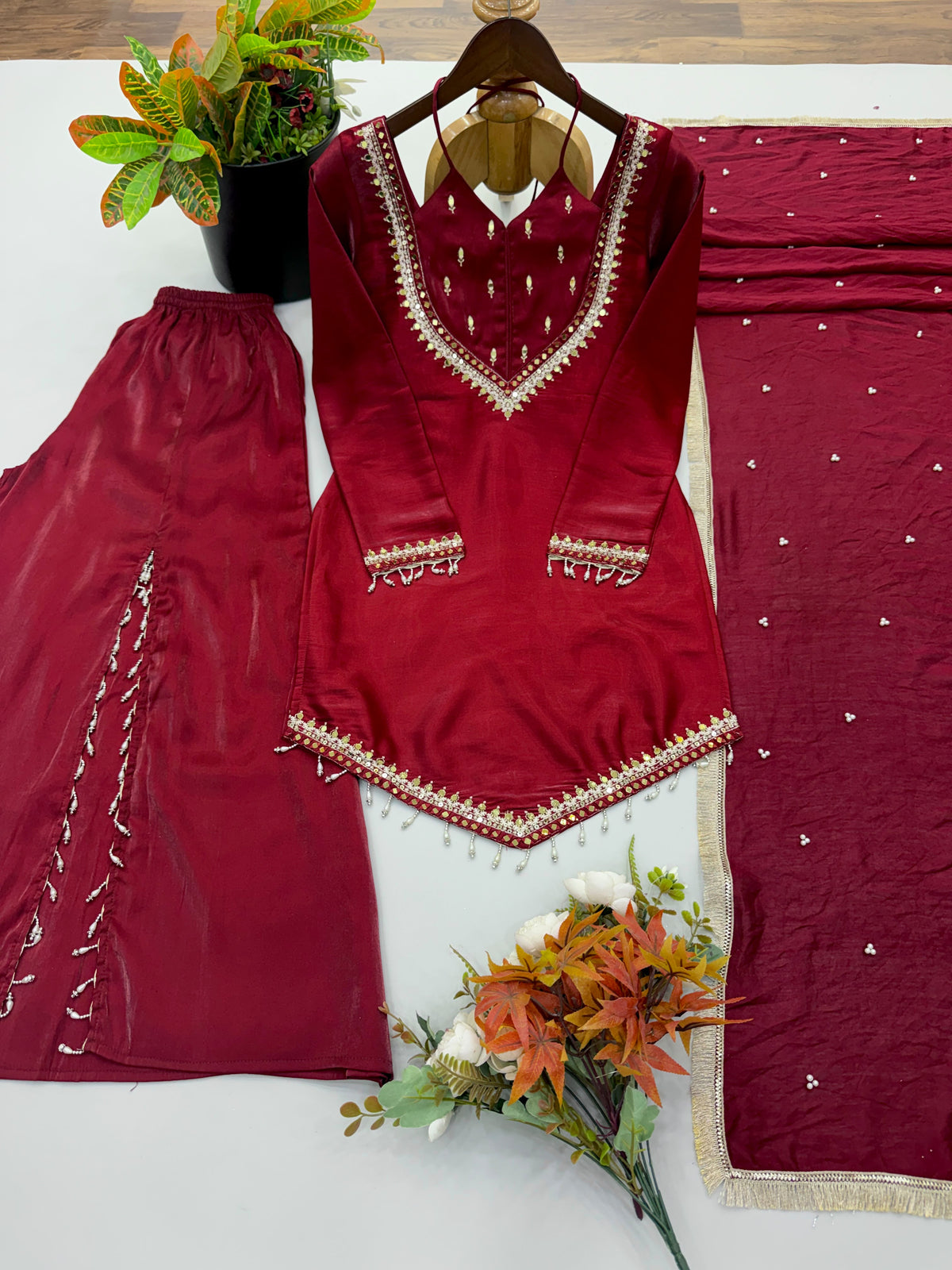 Designer party wear sharara set with lace border moti work