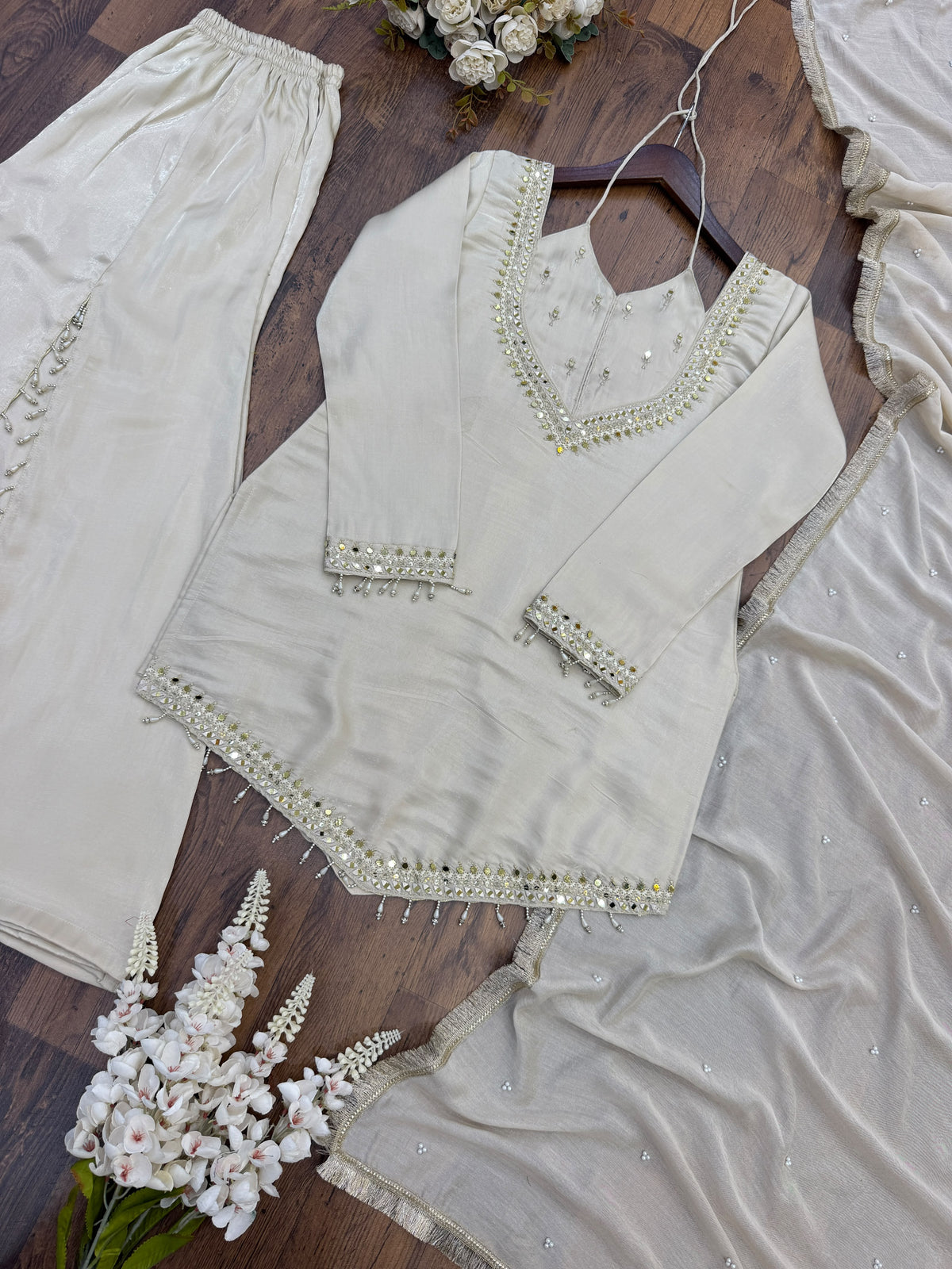 Designer party wear sharara set with lace border moti work