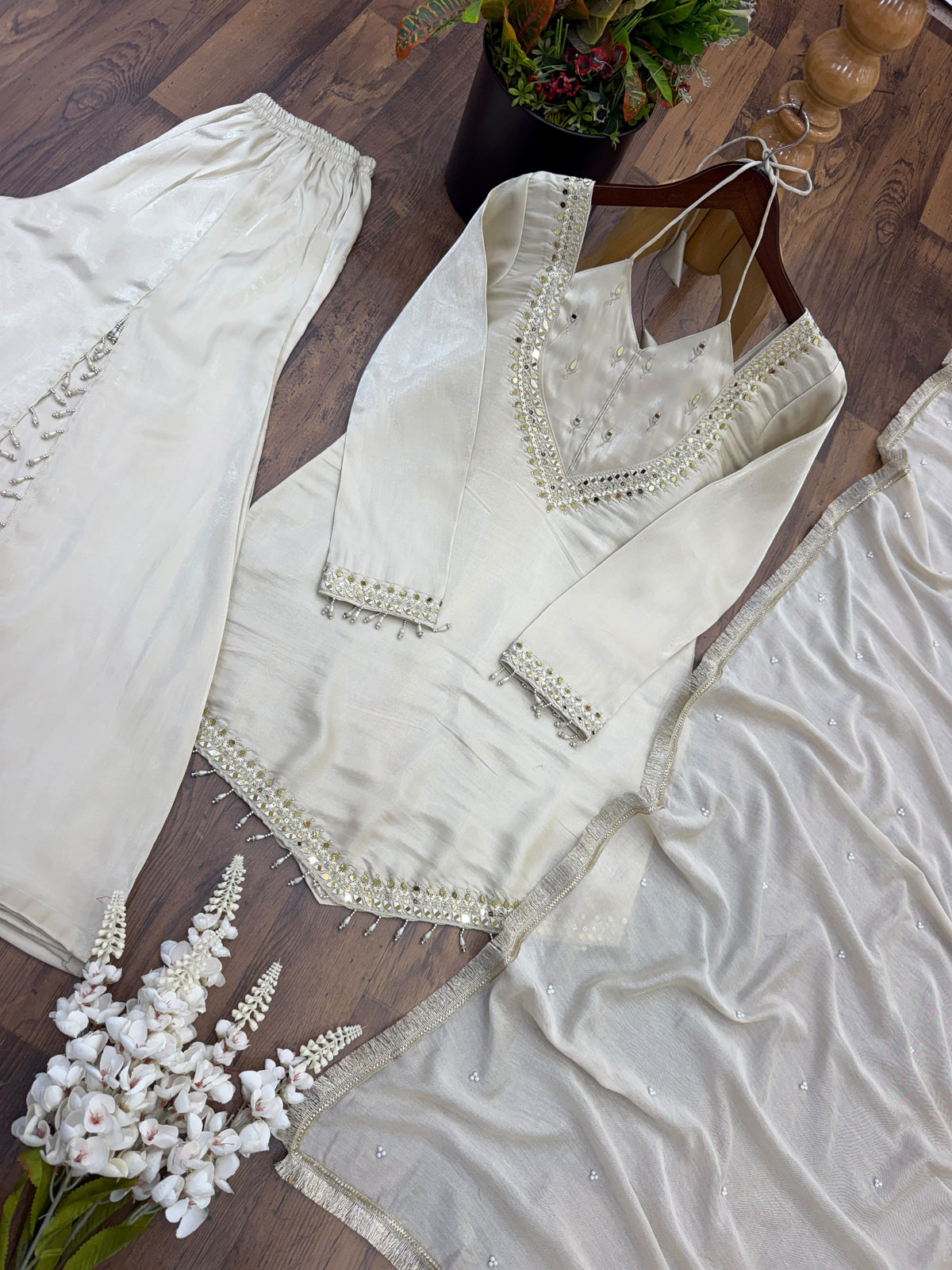 Designer party wear sharara set with lace border moti work