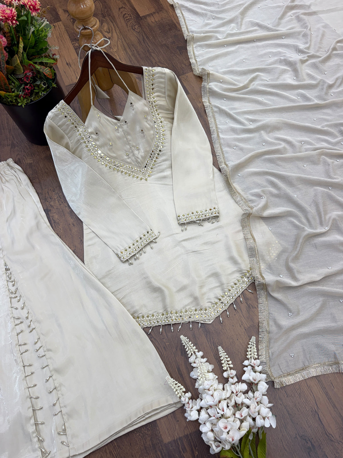 Designer party wear sharara set with lace border moti work